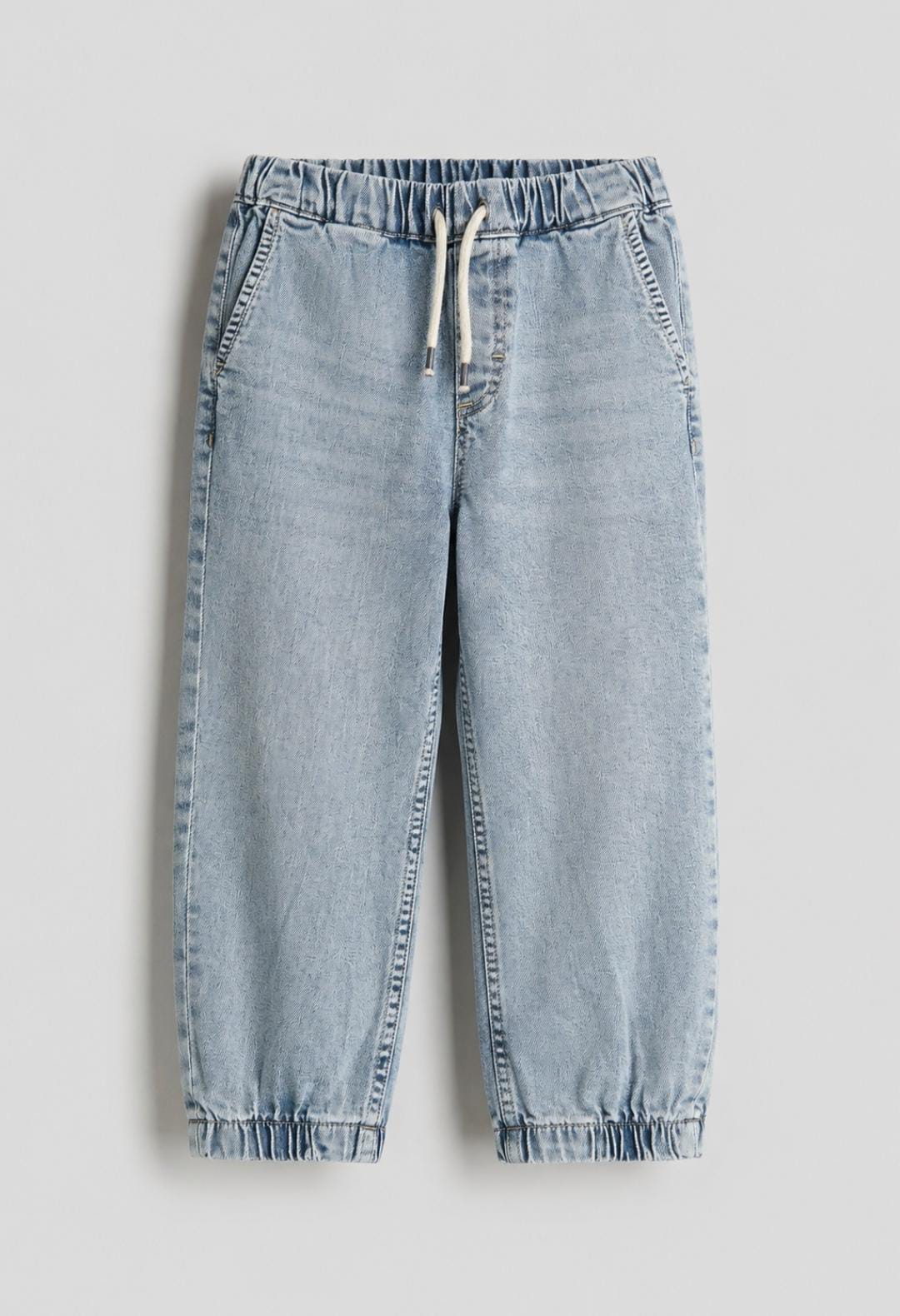 Light washed blue jogger denim jeans